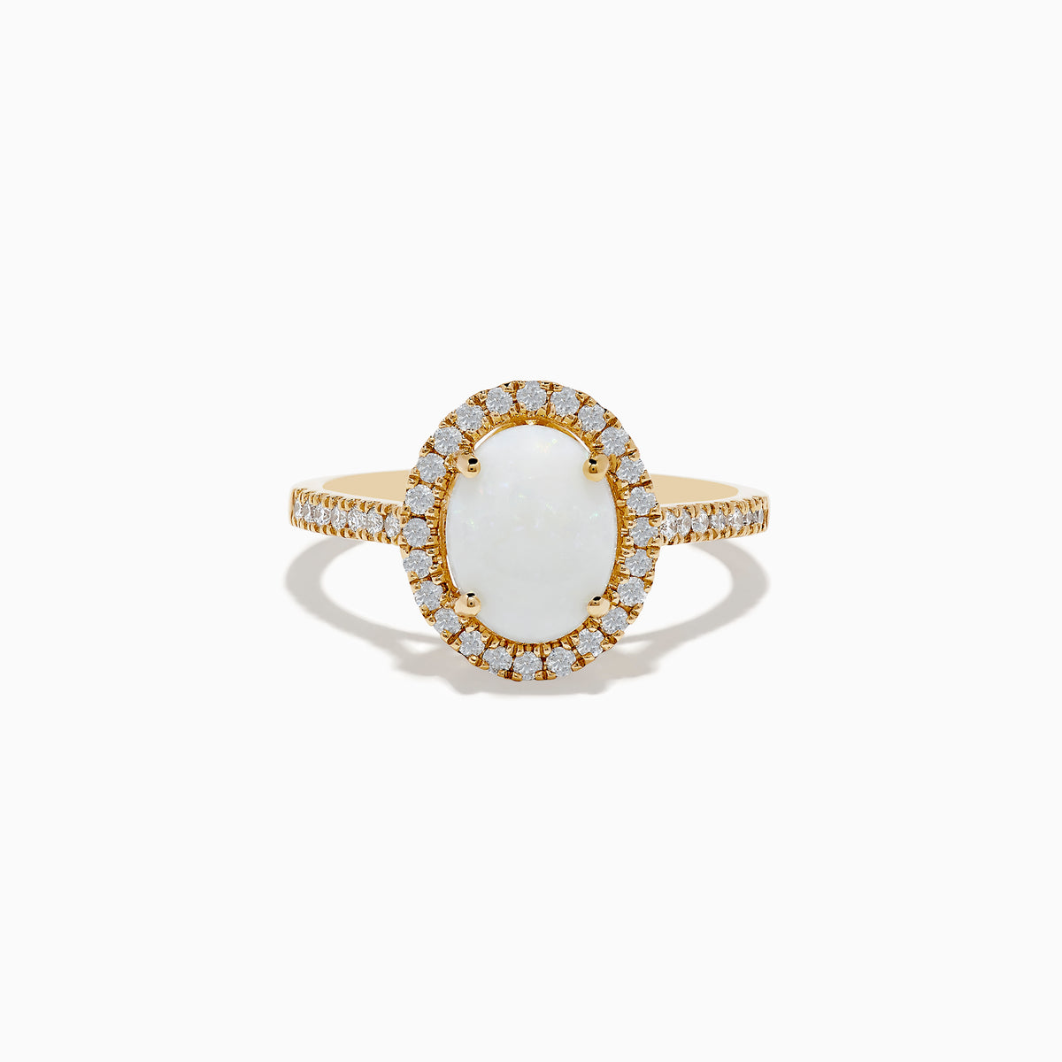 The Aurora 14K Yellow Gold Opal and Diamond Ring showcases an oval opal center, haloed by round diamonds and accented with more diamonds along its elegant band.