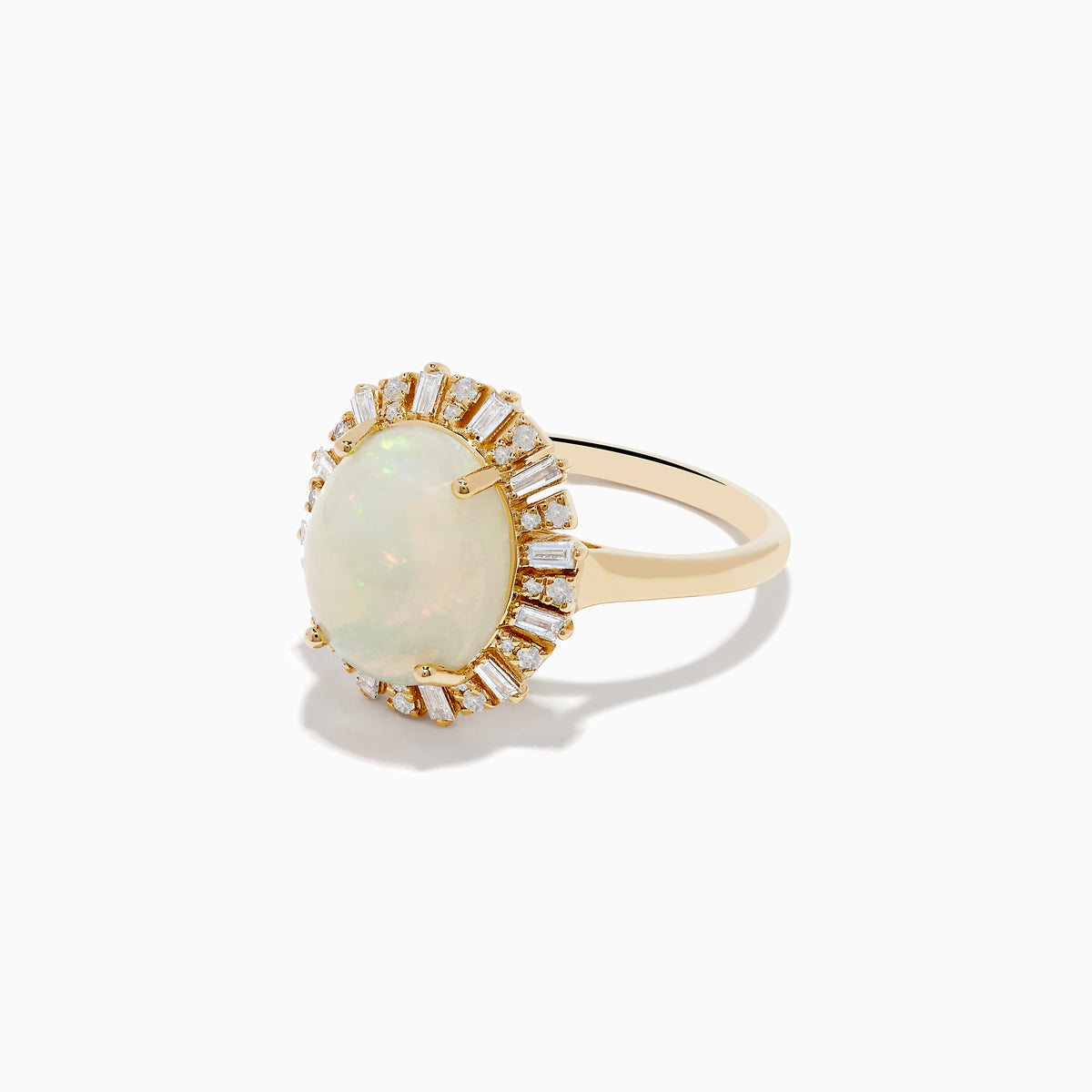 The Aurora 14K Yellow Gold Opal Diamond Ring showcases an oval opal center, encircled by a halo of baguette-cut diamonds, set against a white background.