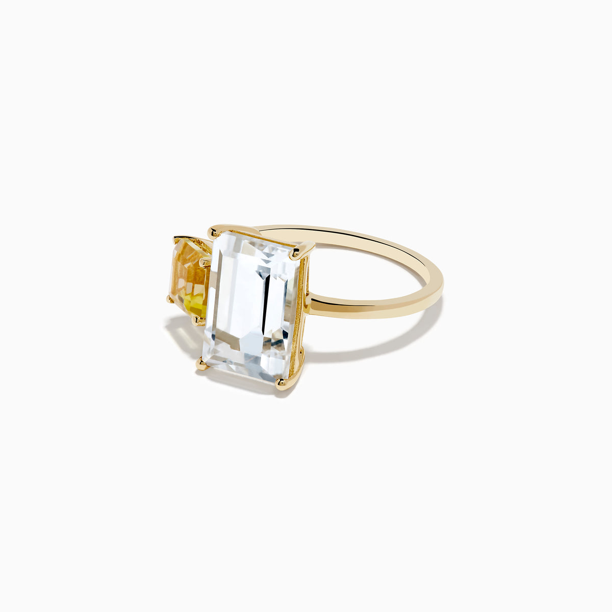 The 14K Yellow Gold White Topaz and Lemon Quartz Toi et Moi Ring showcases a large rectangular White Topaz beside a smaller Lemon Quartz, both set on a simple yellow gold band.