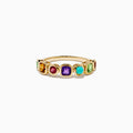 The 14K Yellow Gold Multi Color Gemstone Bezel Band features a row of bezel-set purple, red, turquoise, orange, and green gemstones in various shapes and sizes.