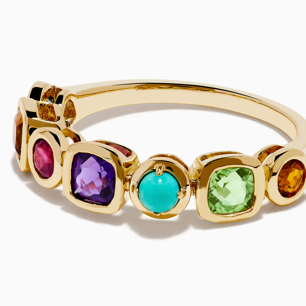 The 14K Yellow Gold Multi Color Gemstone Bezel Band features a row of bezel-set purple, red, turquoise, orange, and green gemstones in various shapes and sizes.
