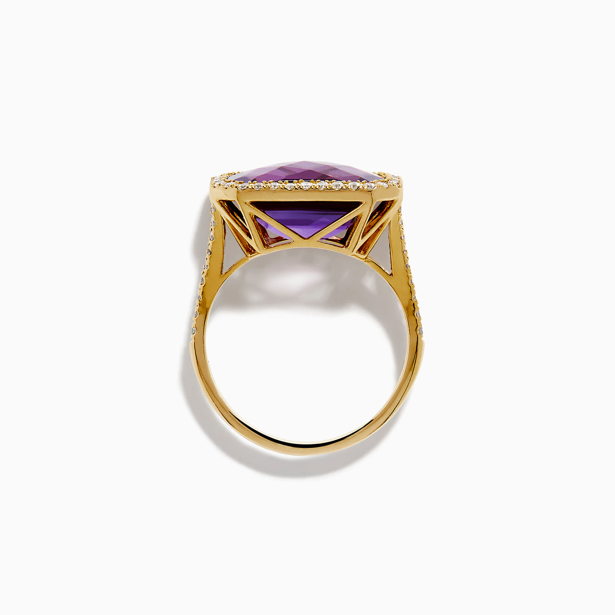 The 14K Yellow Gold Amethyst and Diamond Halo East West Cocktail Ring showcases a rectangular purple amethyst center with a diamond halo, set on yellow gold, displayed on a plain white background.