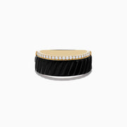 The Mens Eclipse 14K Yellow Gold Onyx and Diamond Band Ring features a row of small white diamonds atop a wide, black ridged onyx band, set against a white background.