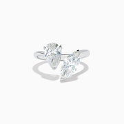 The Lab Grown Diamond Toi Et Moi Ring in 14K White Gold features two striking clear diamonds—a pear-shaped and a marquise-cut—set on open ends of the band, shown against a plain white background.