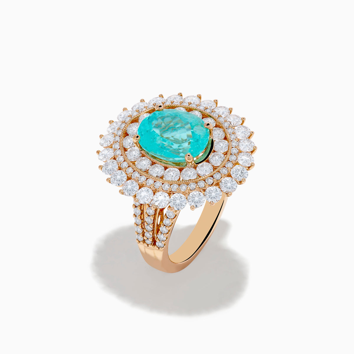 The Effy Hematian 18K Rose Gold Paraiba and Diamond Ring features an oval turquoise center stone, surrounded by sparkling round white diamonds in a double halo design, set against a white background.