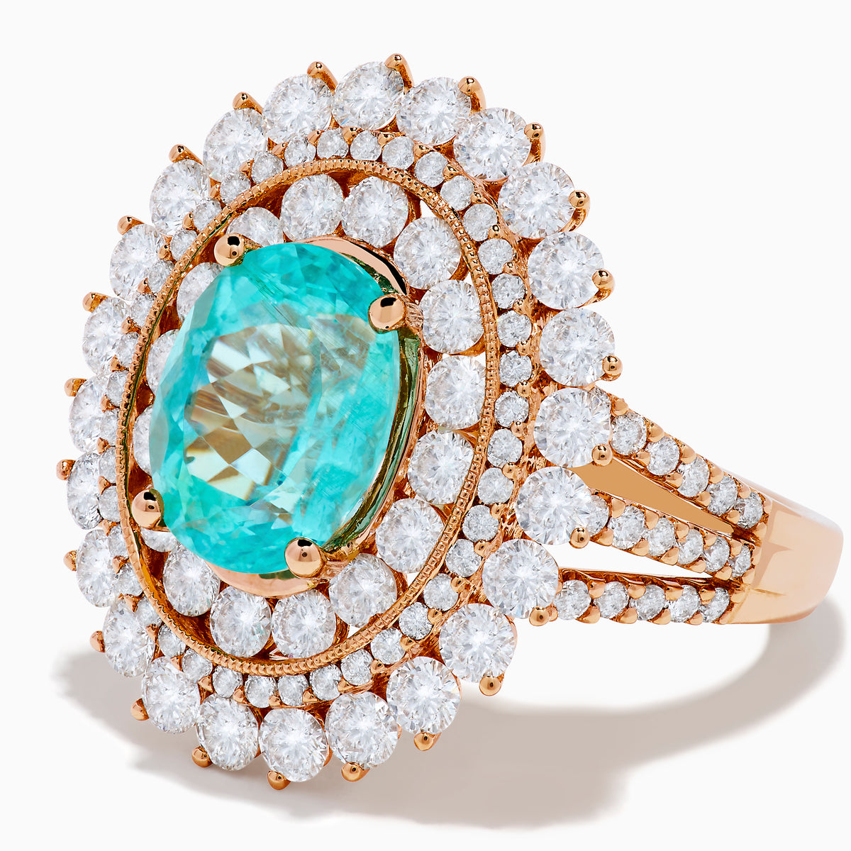 The Effy Hematian 18K Rose Gold Paraiba and Diamond Ring features an oval turquoise center stone, surrounded by sparkling round white diamonds in a double halo design, set against a white background.