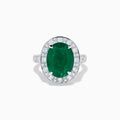 The Effy Hematian 18K White Gold Oval Emerald and Diamond Halo Ring is displayed against a pristine white background.
