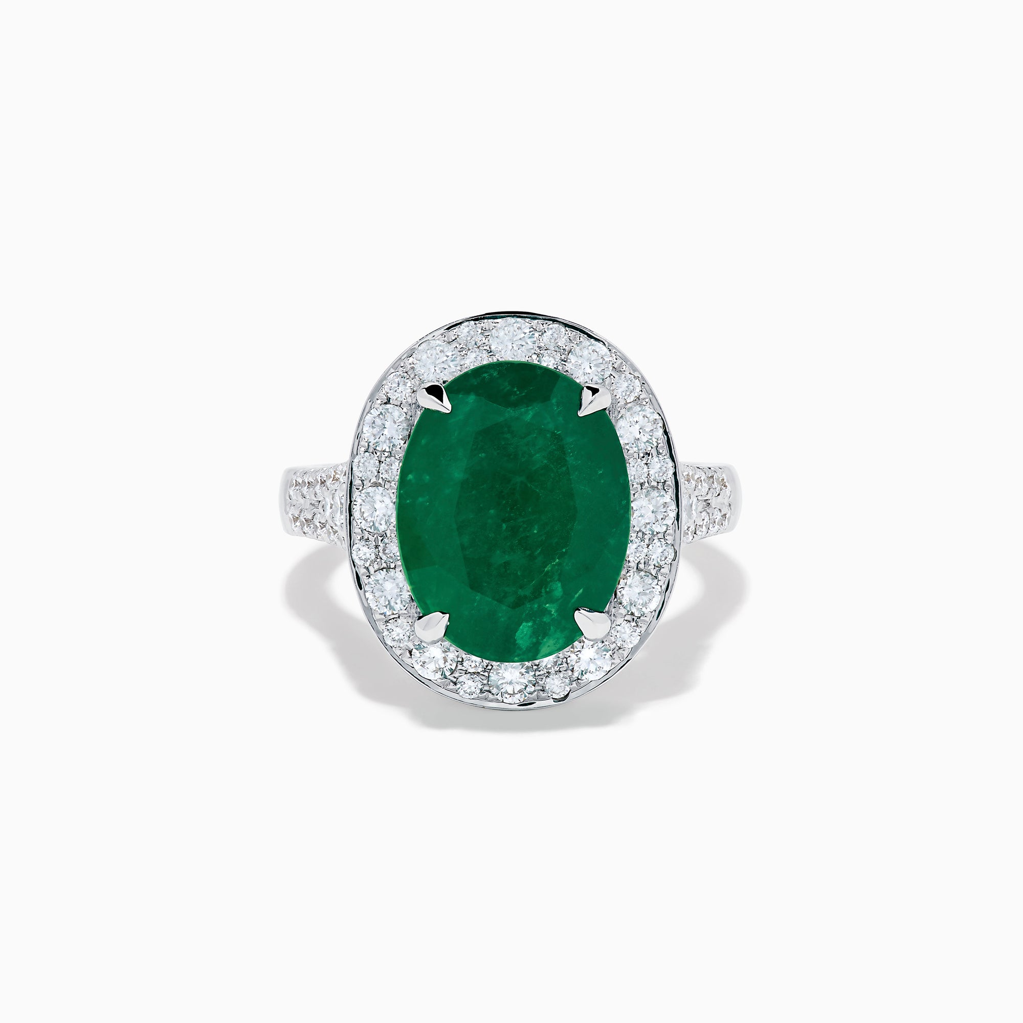 The Effy Hematian 18K White Gold Oval Emerald and Diamond Halo Ring is displayed against a pristine white background.