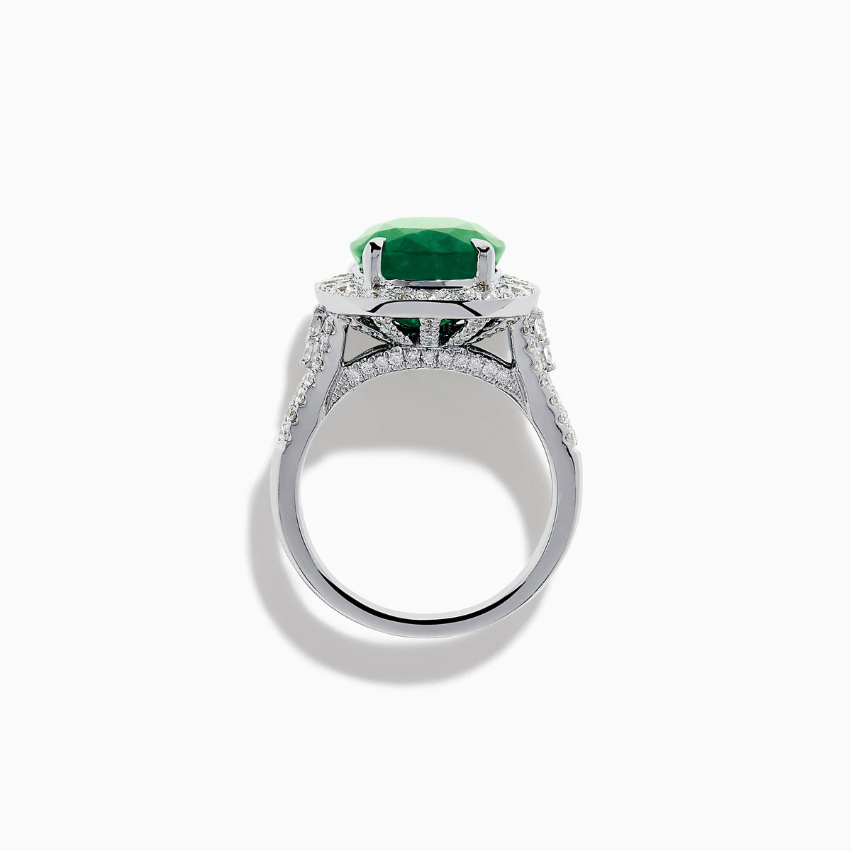 The Effy Hematian 18K White Gold Oval Emerald and Diamond Halo Ring is displayed against a pristine white background.
