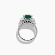 The Effy Hematian 18K White Gold Oval Emerald and Diamond Halo Ring is displayed against a pristine white background.