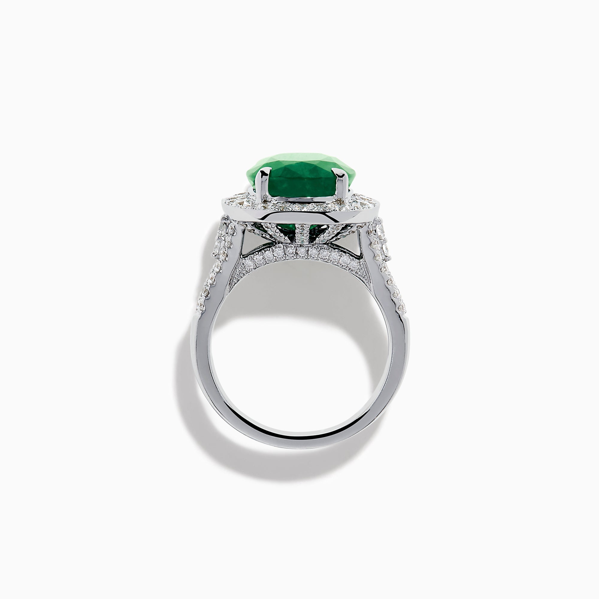 The Effy Hematian 18K White Gold Oval Emerald and Diamond Halo Ring is displayed against a pristine white background.
