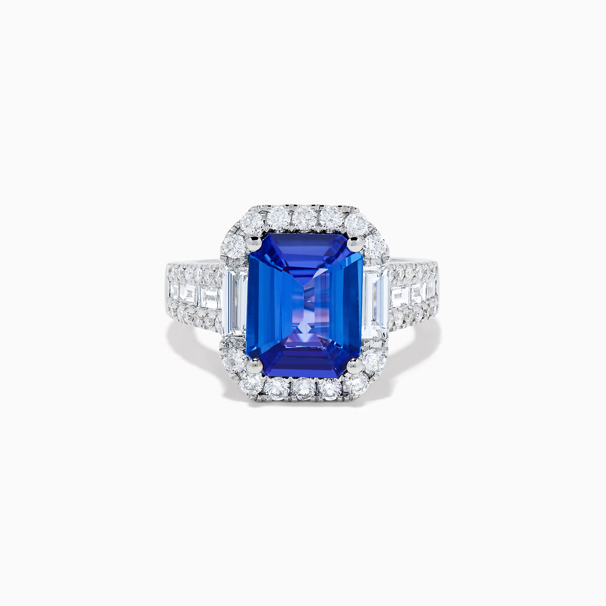The Effy Hematian 18K White Gold Tanzanite and Diamond Halo Cocktail Ring is shown from the front, featuring an emerald-cut blue tanzanite with a diamond halo and diamond-accented band against a white background.