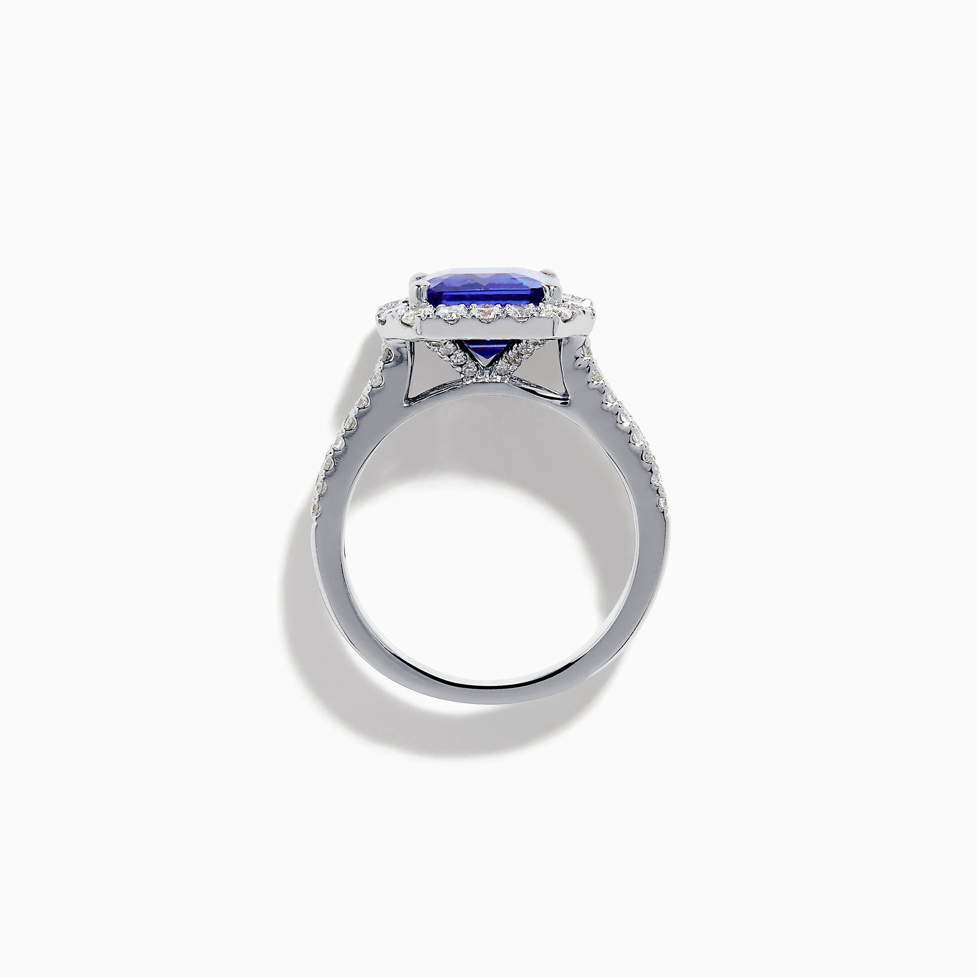 The Effy Hematian 18K White Gold Tanzanite and Diamond Halo Cocktail Ring is shown from the front, featuring an emerald-cut blue tanzanite with a diamond halo and diamond-accented band against a white background.