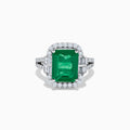 The Effy Hematian 14K White Gold Emerald and Diamond Cocktail Ring showcases a rectangular emerald surrounded by round and baguette diamonds on a sleek white gold band, displayed against a white background.