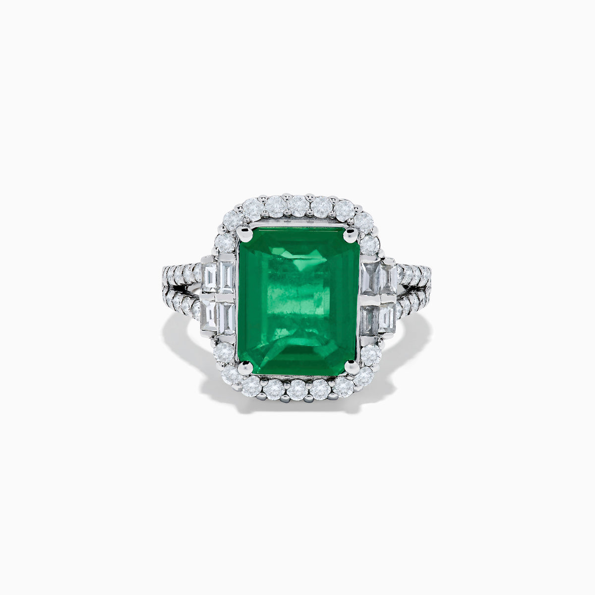 The Effy Hematian 14K White Gold Emerald and Diamond Cocktail Ring showcases a rectangular emerald surrounded by round and baguette diamonds on a sleek white gold band, displayed against a white background.