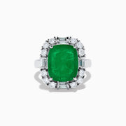The Brasilica 14K White Gold Emerald and Diamond Ring features a large rectangular emerald center, surrounded by a halo of round and baguette-cut white diamonds, set on sleek 14K white gold.
