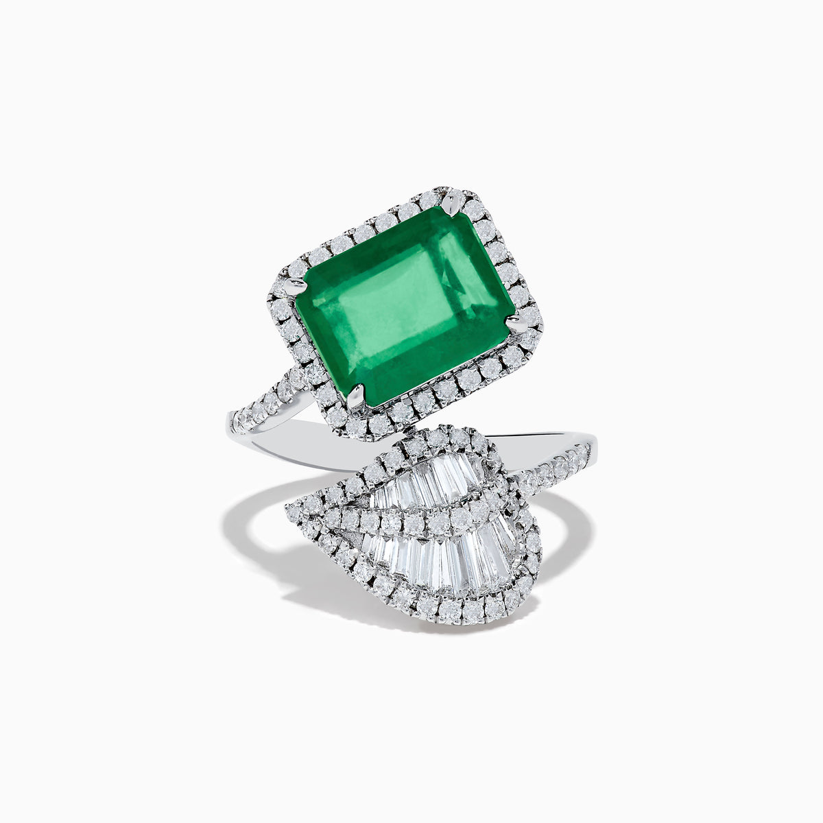 The Brasilica 14K White Gold Emerald and Diamond Leaf Ring features a large rectangular emerald, small diamond accents, and a diamond-encrusted leaf design on a split band.