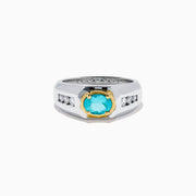 A mens 18K two tone GIA certified Paraiba and diamond ring featuring an oval Paraiba gemstone in a gold setting, accented by three diamonds on each side, displayed on a white background.