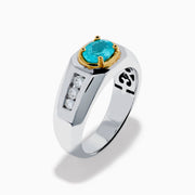 A mens 18K two tone GIA certified Paraiba and diamond ring featuring an oval Paraiba gemstone in a gold setting, accented by three diamonds on each side, displayed on a white background.