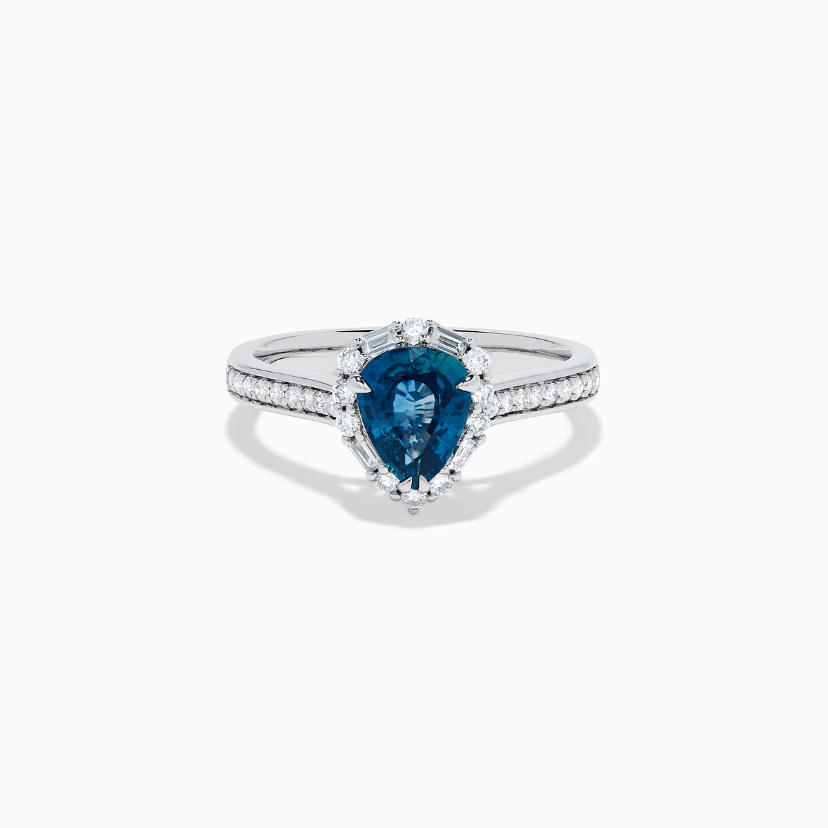 The Effy Hematian 18K White Gold Ring features a pear-shaped blue sapphire, surrounded by a halo of diamonds and set on a diamond-studded band, elegantly displayed against a white background.