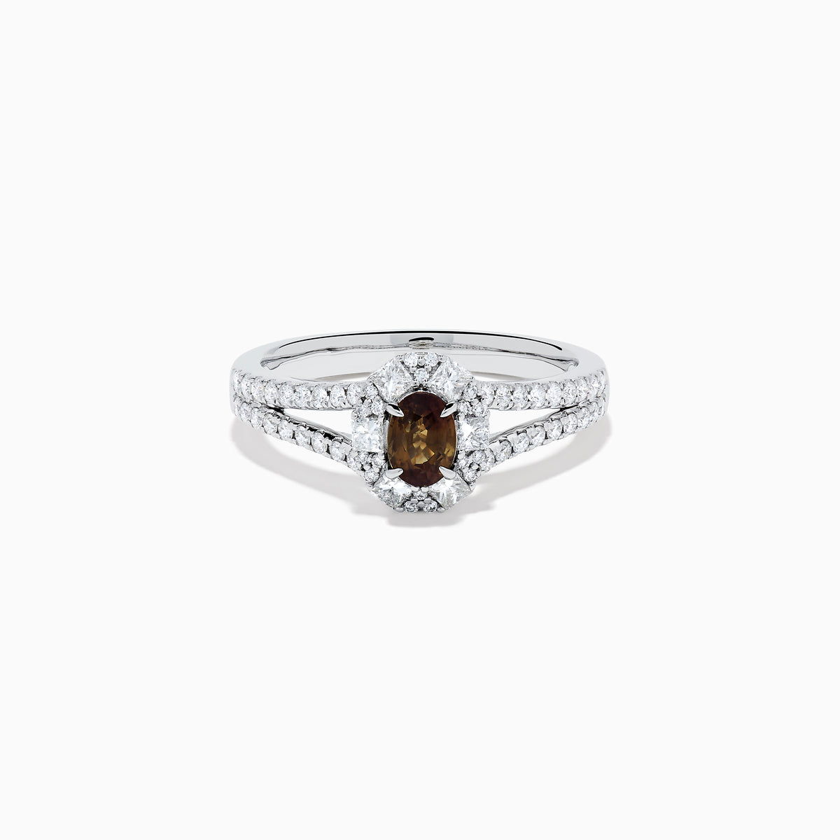 The Effy Hematian 18K White Gold Oval Alexandrite and Diamond Halo Ring features a central oval alexandrite surrounded by clear diamond accents in a halo and along the split shank band.