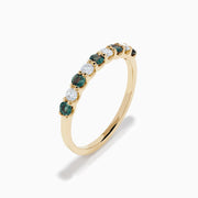 The Effy Hematian 14K Yellow Gold 9-Stone Ring features alternating round white diamonds and green alexandrites set in a row along the band, shown on a white background.
