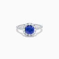 The Effy Hematian 18K White Gold Purple Sapphire and Diamond Halo Ring features a stunning round purple sapphire at the center, surrounded by sparkling diamonds with additional diamond accents along the band.