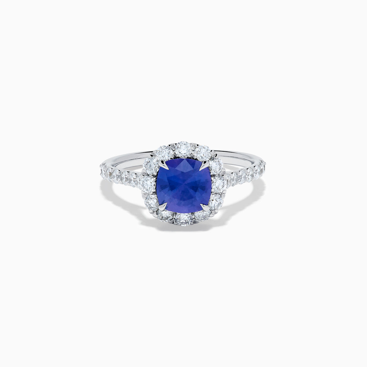 The Effy Hematian 18K White Gold Purple Sapphire and Diamond Halo Ring features a stunning round purple sapphire at the center, surrounded by sparkling diamonds with additional diamond accents along the band.