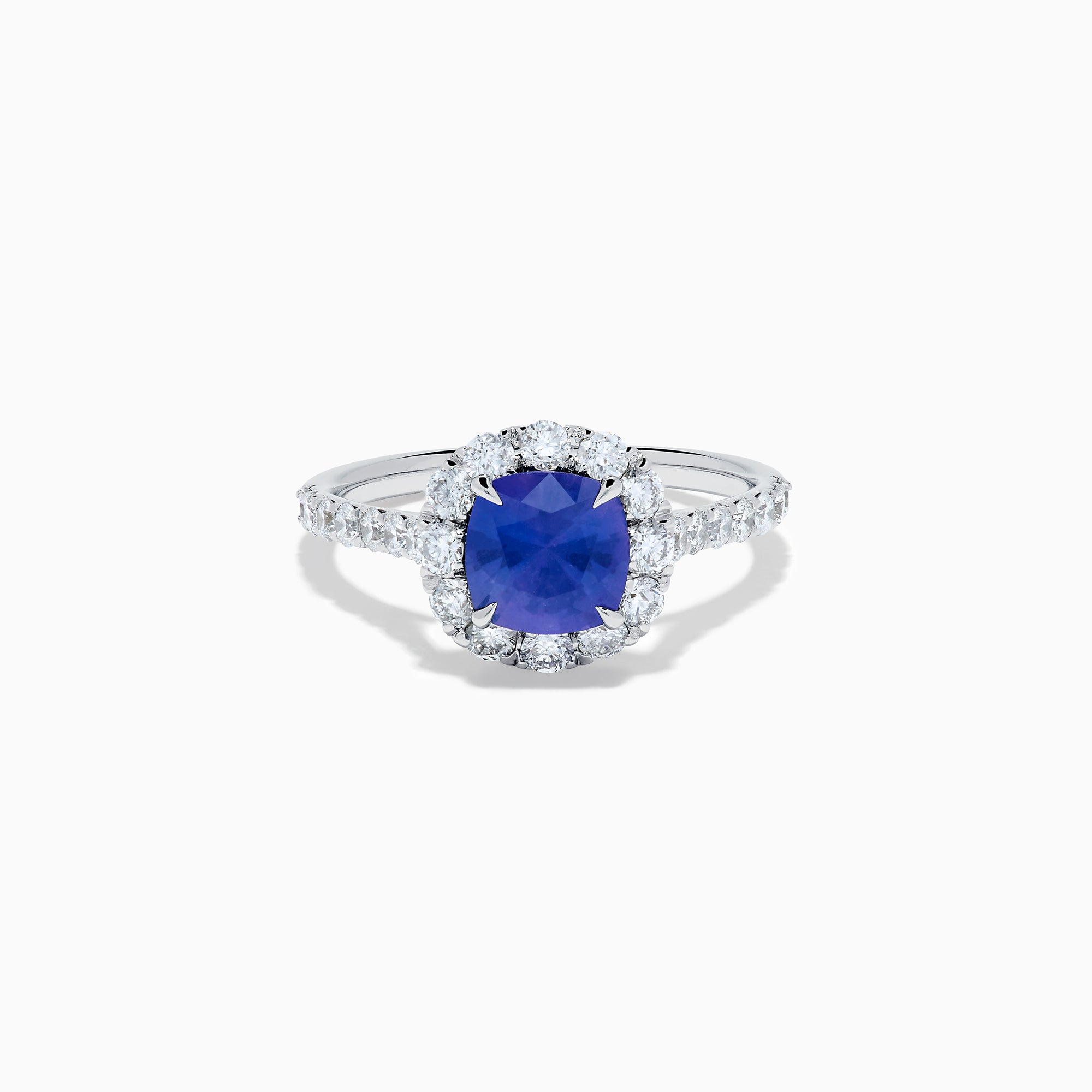 The Effy Hematian 18K White Gold Purple Sapphire and Diamond Halo Ring features a stunning round purple sapphire at the center, surrounded by sparkling diamonds with additional diamond accents along the band.