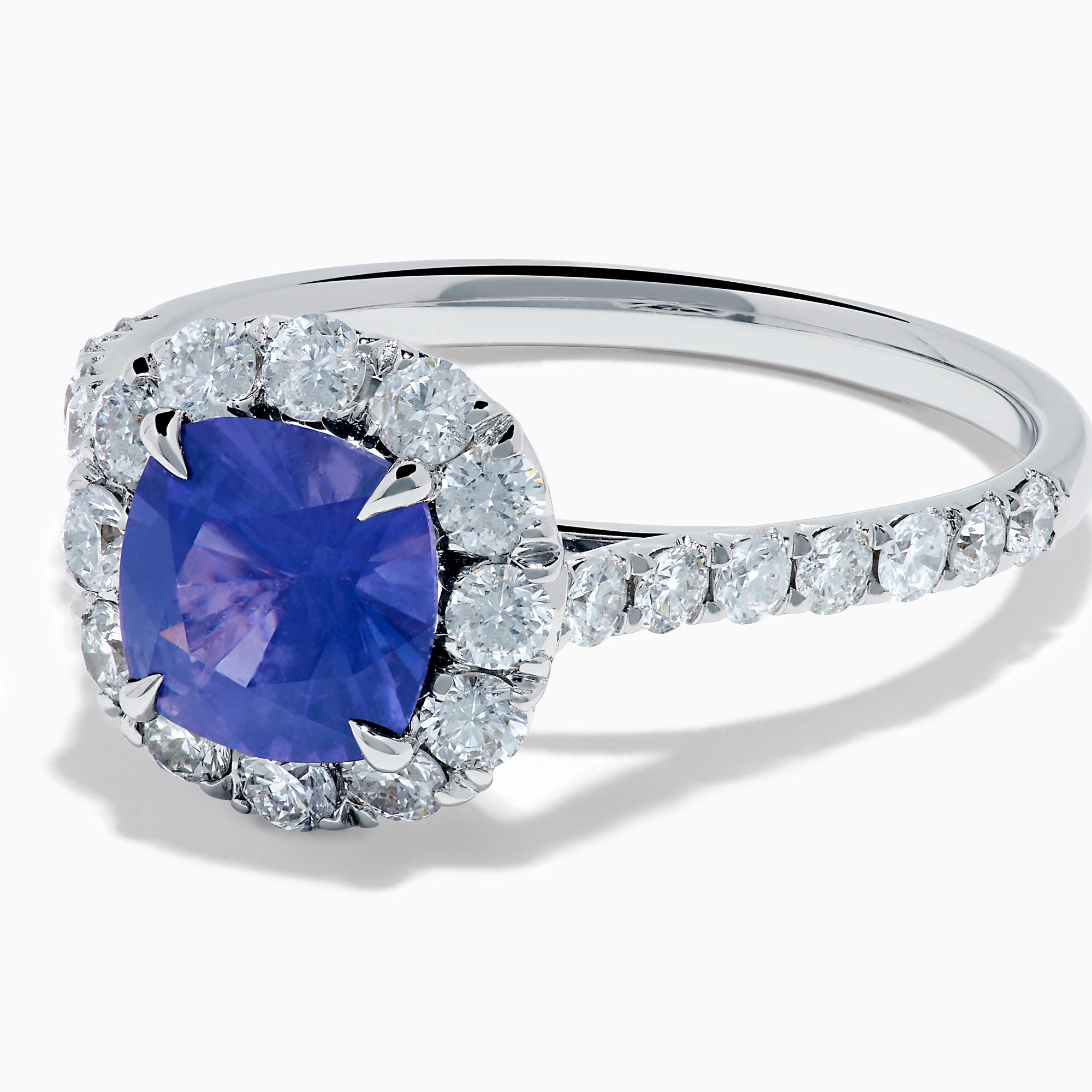 The Effy Hematian 18K White Gold Purple Sapphire and Diamond Halo Ring features a stunning round purple sapphire at the center, surrounded by sparkling diamonds with additional diamond accents along the band.
