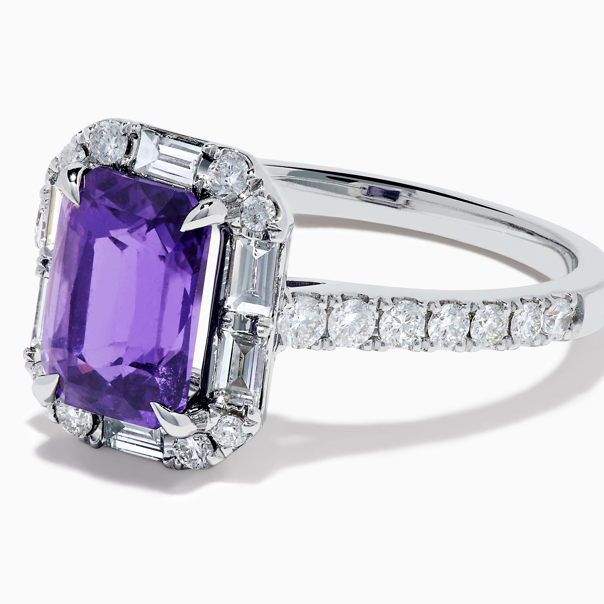 The Effy Hematian 18K White Gold Octagon Purple Sapphire and Diamond Halo Ring features a striking octagonal purple sapphire centerpiece, encircled by sparkling diamond halos on the band and around the main stone.