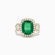 The Effy Hematian 18K Yellow Gold Emerald and Diamond Three Stone Ring features a large cushion-cut emerald, haloed by round white diamonds and accented with diamond clusters for a modern twist on the classic three stone style.