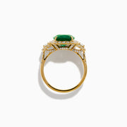 The Effy Hematian 18K Yellow Gold Emerald and Diamond Three Stone Ring features a large cushion-cut emerald, haloed by round white diamonds and accented with diamond clusters for a modern twist on the classic three stone style.