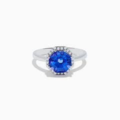 The Nahla Siri 14K Gold Octagon Cut Tanzanite and Diamond Ring showcases a large octagon-cut tanzanite at the center, bordered by sparkling diamonds, shown against a white background.