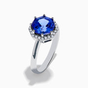 The Nahla Siri 14K Gold Octagon Cut Tanzanite and Diamond Ring showcases a large octagon-cut tanzanite at the center, bordered by sparkling diamonds, shown against a white background.