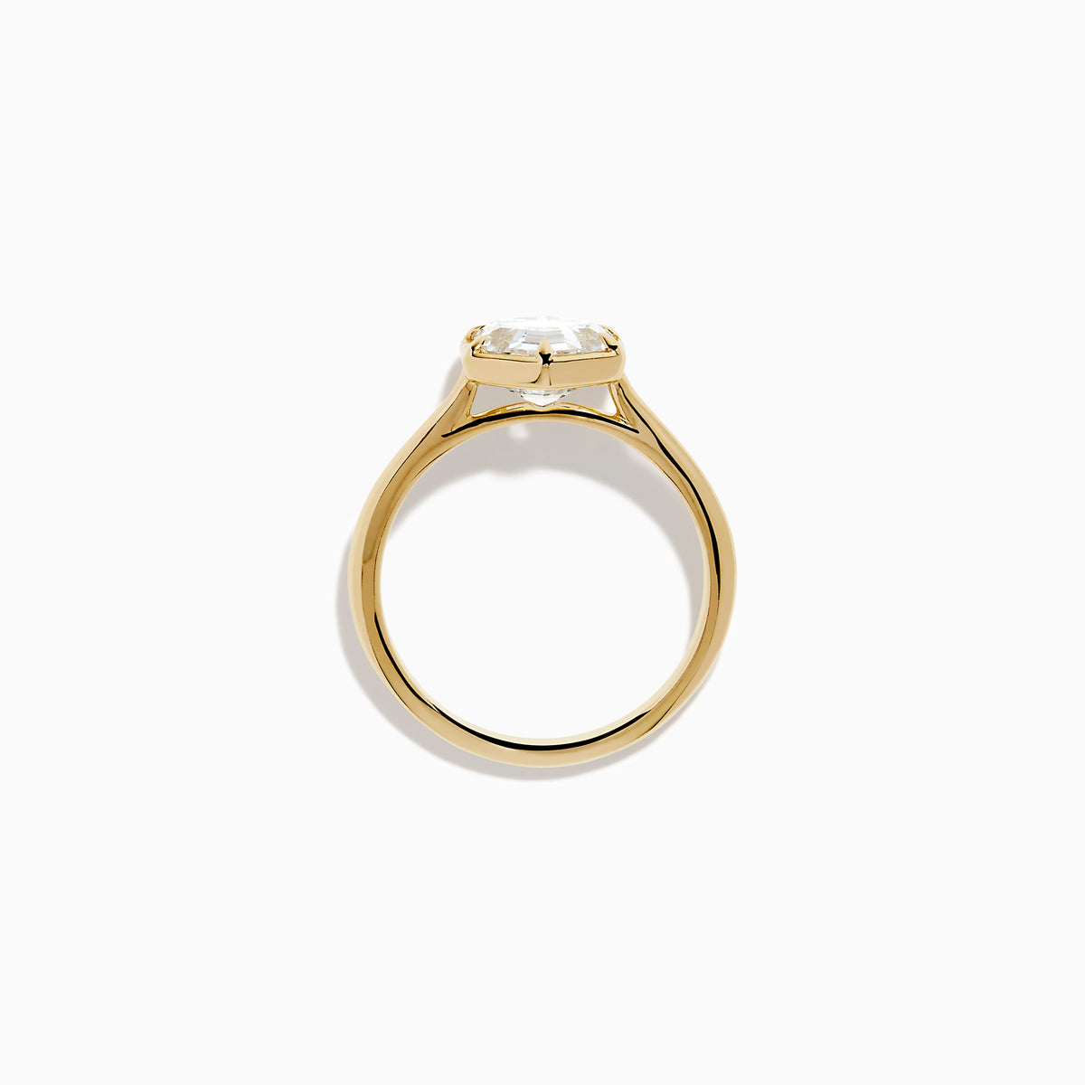 The Lab Grown Diamond 2.00ct Hexagon Solitaire Ring in 14K Yellow Gold showcases a hexagon-shaped, lab grown diamond with a geometric stepped cut, set on a sleek, polished gold band and displayed against a white background.