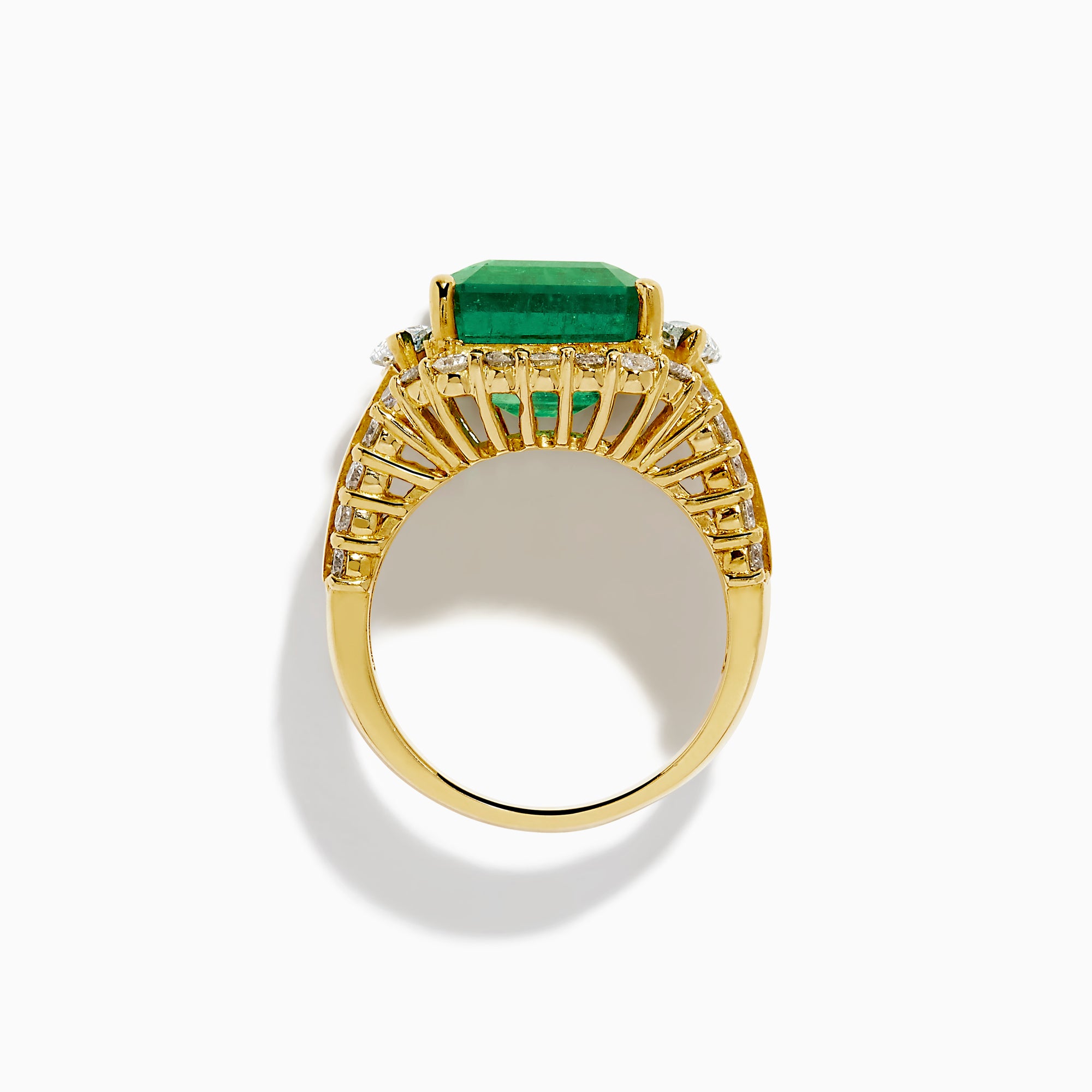 The 18K Yellow Gold Emerald and Diamond Ring features a large square green emerald center, encircled by round and baguette-cut white diamonds along the band and around the emerald, set against a white background.