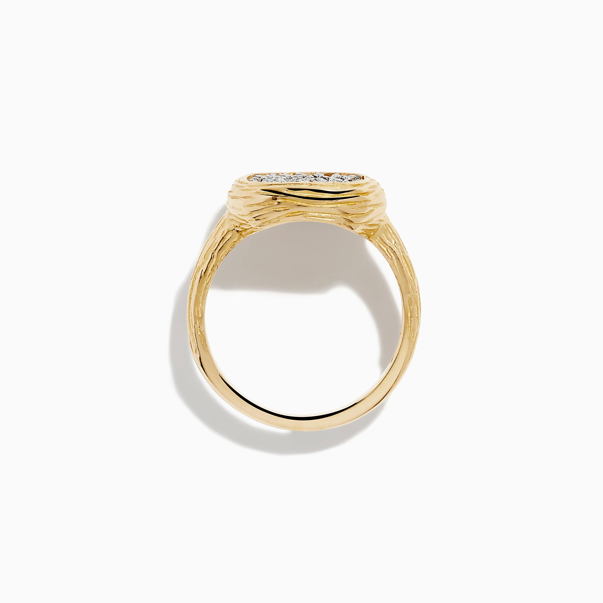 The D'Oro 14K Two Tone Gold Diamond Signet Ring features a textured band and a square-shaped cluster of sparkling diamonds at the center, giving a modern twist to the classic signet ring style.
