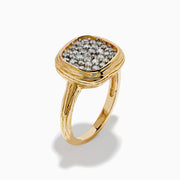 The D'Oro 14K Two Tone Gold Diamond Signet Ring features a textured band and a square-shaped cluster of sparkling diamonds at the center, giving a modern twist to the classic signet ring style.