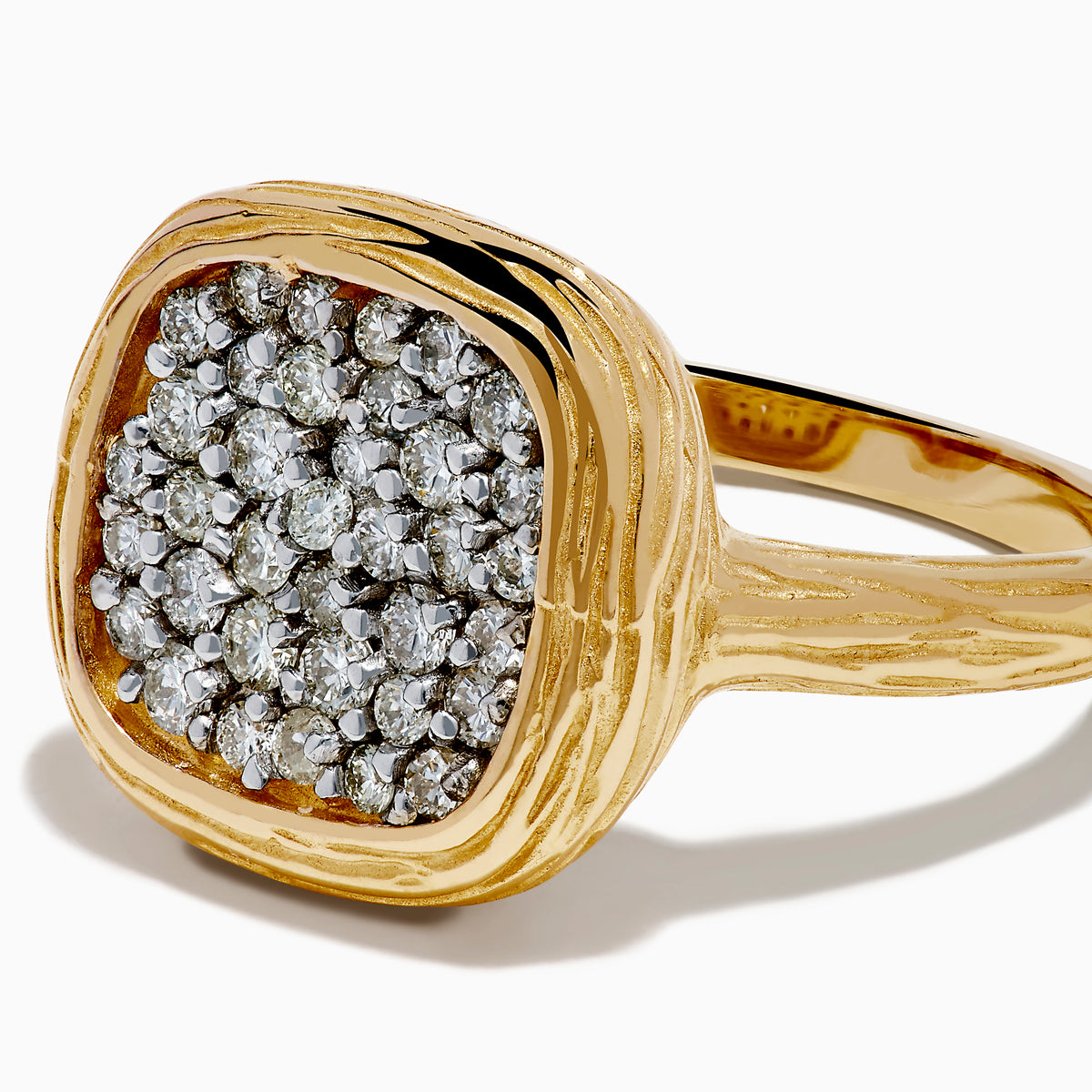 The D'Oro 14K Two Tone Gold Diamond Signet Ring features a textured band and a square-shaped cluster of sparkling diamonds at the center, giving a modern twist to the classic signet ring style.