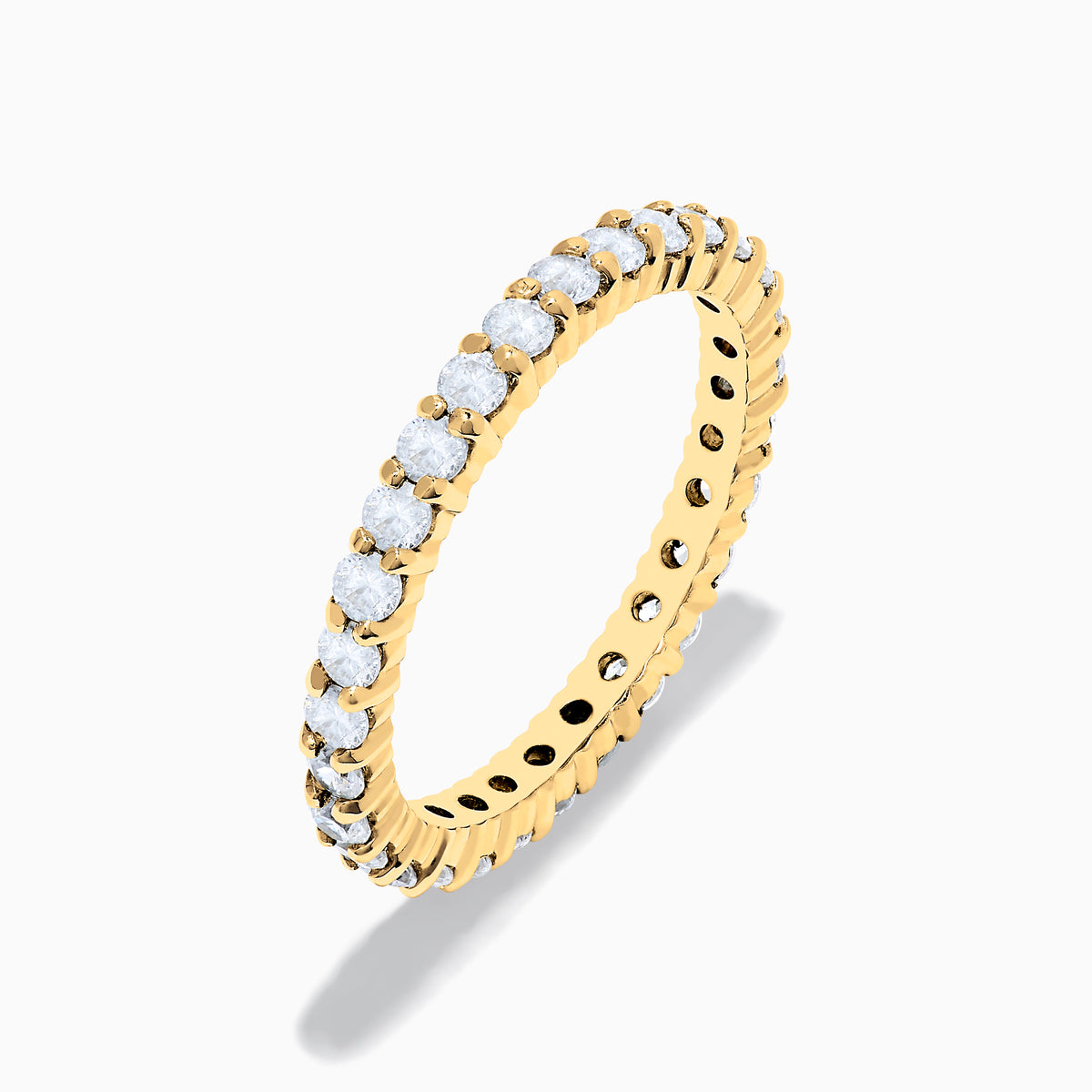The 14K Yellow Gold Prong Set Diamond Eternity Band, 1.00 TCW, is shown against a plain white background.