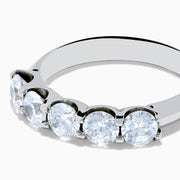 The 14K White Gold 5-Stone U-Prong Diamond Band, 1.50 TCW features five round diamonds in a U-prong setting, showcased against a plain white background.