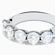 The 14K White Gold 5-Stone U-Prong Diamond Band, 2.50 TCW, features five round diamonds set in a row on a sleek white gold band, shown against a plain white background.