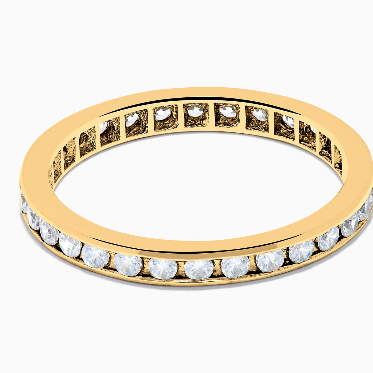 The 14K Yellow Gold Channel Set Diamond Eternity Band, 0.50 TCW, features small round white diamonds encircling the band and is shown on a white background.