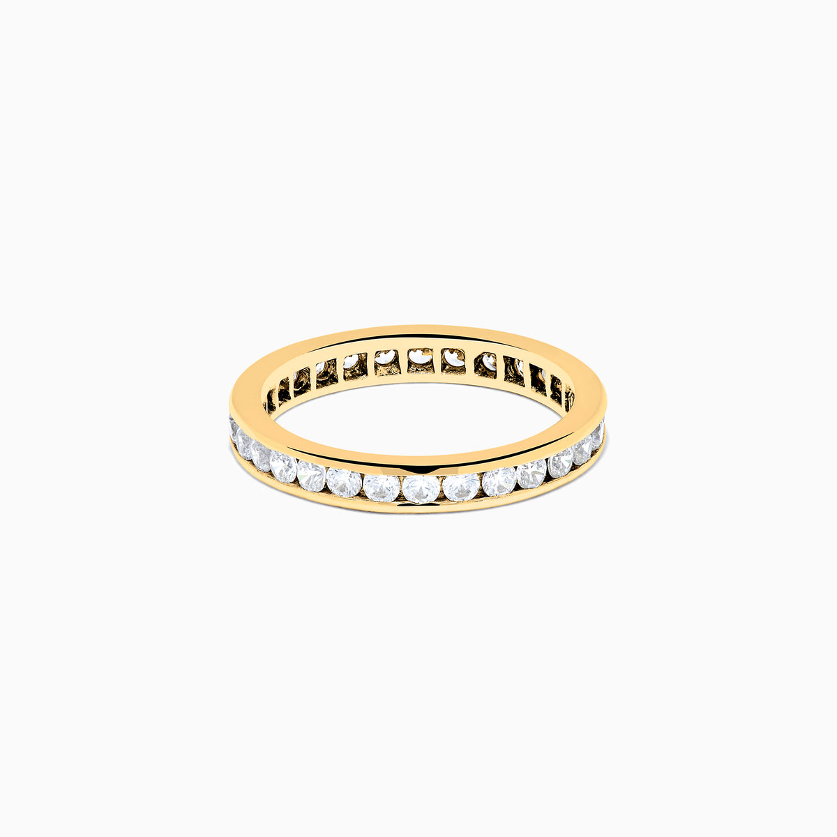 The 14K Yellow Gold Channel Set Diamond Eternity Band, 1.00 TCW, showcases a continuous row of round white diamonds in a channel setting, displayed on a white background.