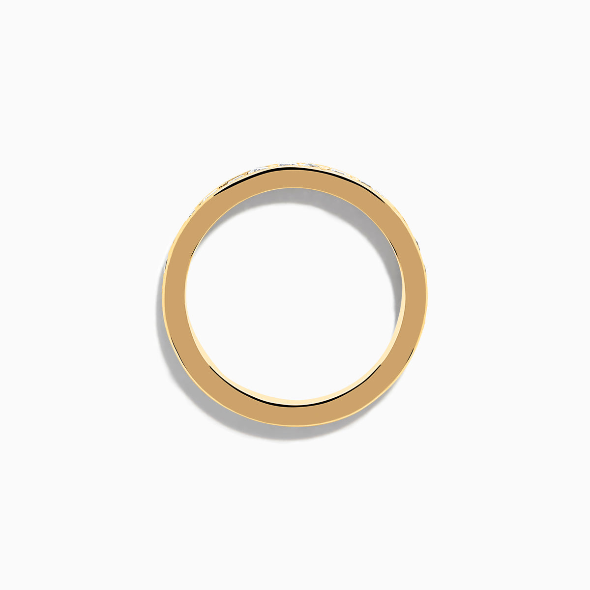 The 14K Yellow Gold Channel Set Diamond Eternity Band, 1.00 TCW, showcases a continuous row of round white diamonds in a channel setting, displayed on a white background.