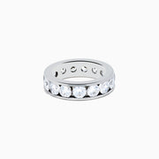 The 14K White Gold Channel Set Diamond Eternity Band features a continuous row of sparkling diamonds, 5.00 TCW, set in a sleek and polished band for a luxurious and elegant look.