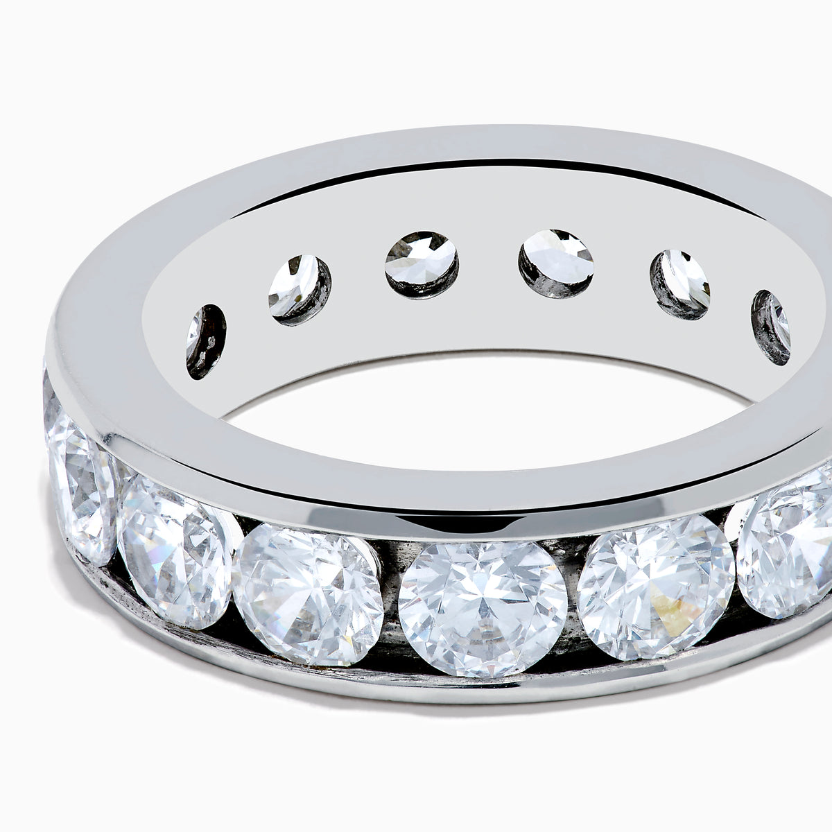 The 14K White Gold Channel Set Diamond Eternity Band features a continuous row of sparkling diamonds, 5.00 TCW, set in a sleek and polished band for a luxurious and elegant look.