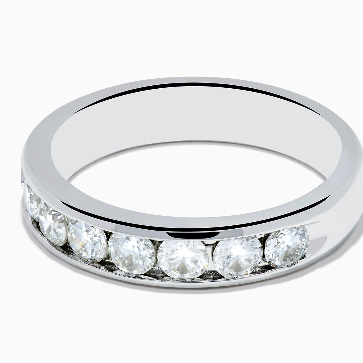 The 14K White Gold 10-Stone Channel Set Diamond Band, 1.00 TCW, features a row of sparkling round diamonds set along the top half and is displayed on a plain white background.