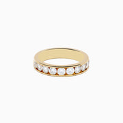 The 14K Yellow Gold 10-Stone Channel Set Diamond Band, 1.00 TCW, features a row of round diamonds channel set around the band and is displayed on a plain white background.